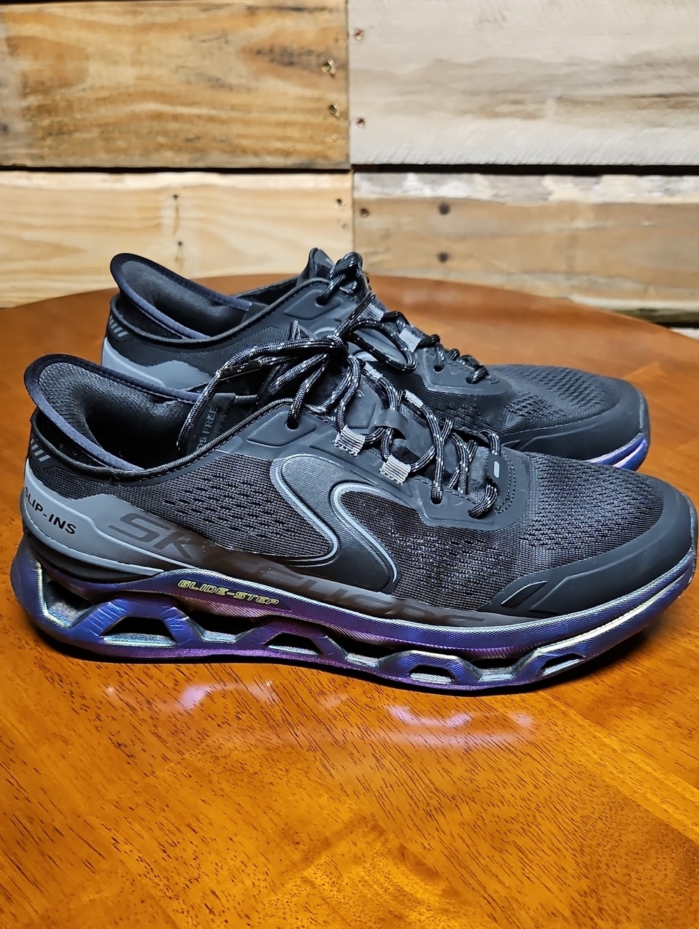 Skechers Men’s Black Athletic Shoes with Iridescent Purple Accents